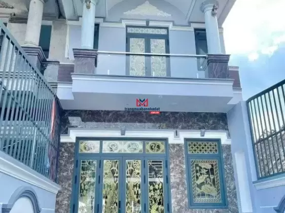 Nhà trệt lầu mới 100% xây kiên cố mặt tiền DX 065 Định Hoà