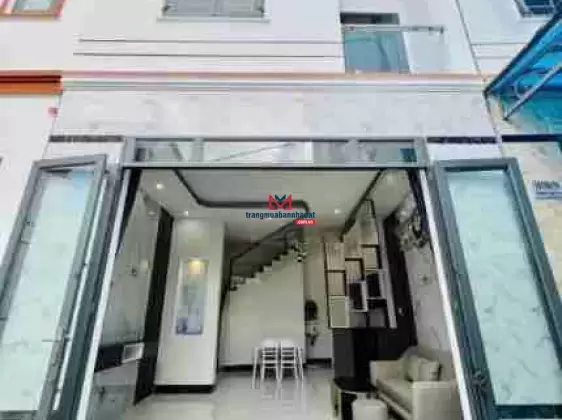 Bán nhà trệt lầu mơi 100% kế bên chợ An Cư DT 5 x 8 DTSD 80m2 sổ hồng hoàn công oto tới nhà